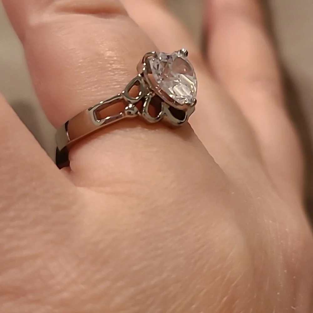 Heart shape cubic zirconia swirl band stainless steel ring